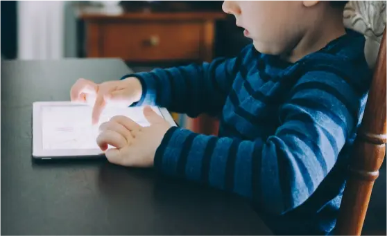 SWS demonstrating a kid using app on ipad